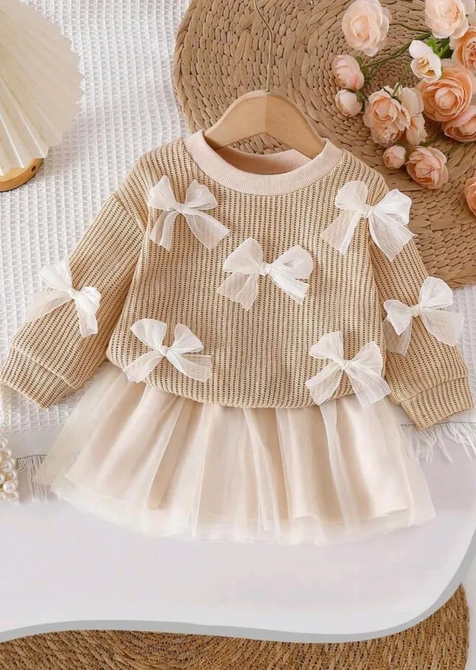 Conjunto suéter lazos + falda — foto 1 de 4