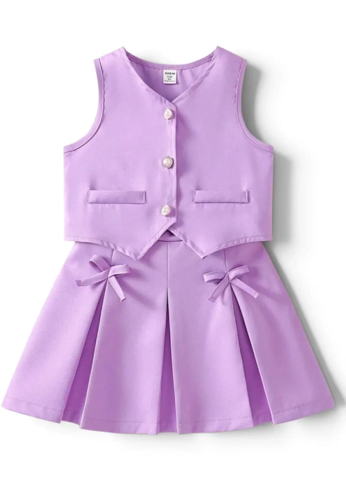 Conjunto chaleco + falda plisada
